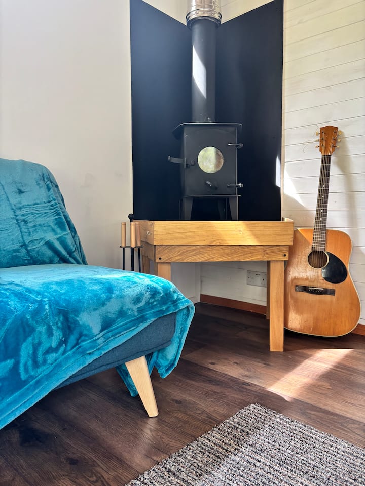 The log burner heats the whole cabin and gives you a cosy glow! 