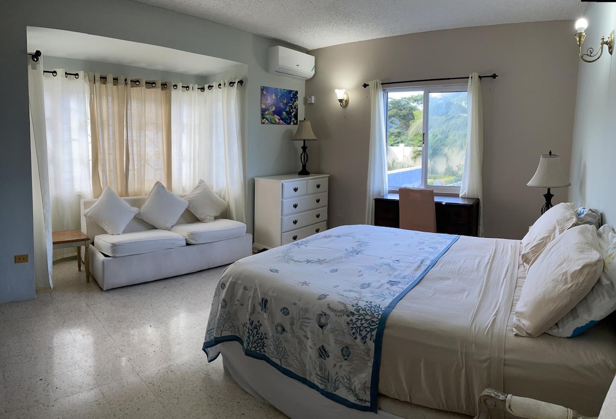 AC available in one room on first floor. Additional cost for use of AC as the house is very open and area windy most times. Guest are asked to keep the windows latched when open to prevent breaking- and door and window closed if AC is used.