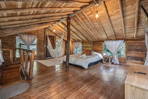 Retreat to a Forest Cabin with a Fireplace & Campfire