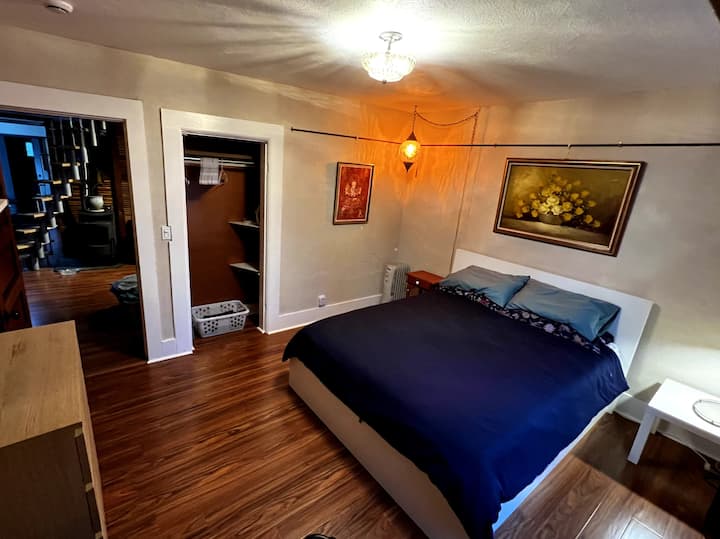 The queen sized bed is so comfortable and made with 4 pillows. There’s an air purifier and fan to provide white noise while you sleep.