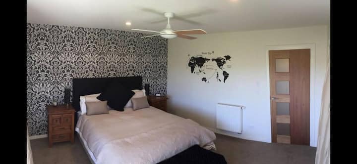 One Super King Bed or two King Single Beds - let us know.