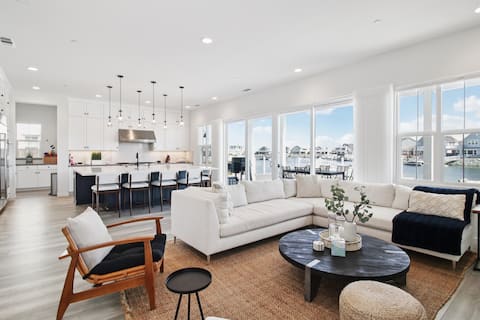 Modern Waterfront paradise, 3 story w/ boat dock.