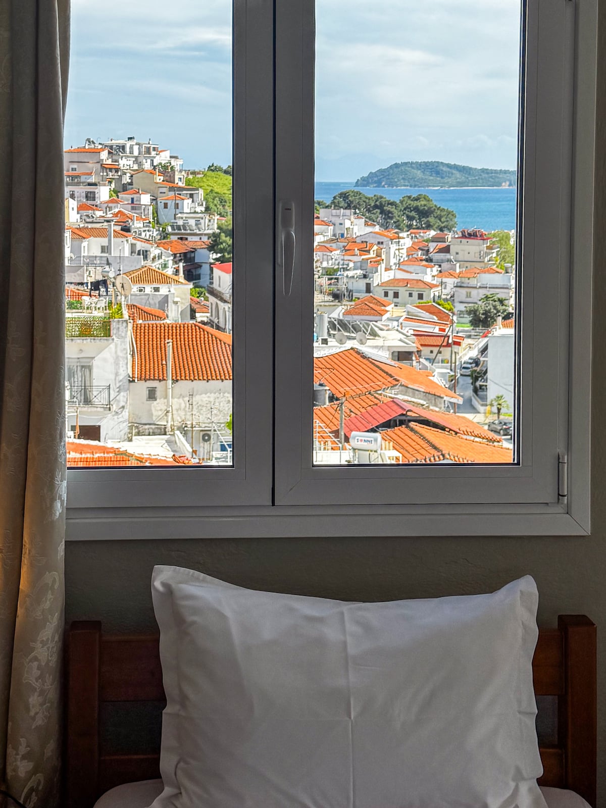 Habitación triple con camas de una plaza.