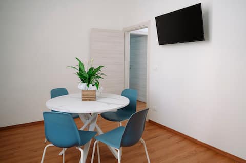 Riviera. Modern room with city center view.
