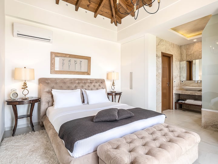 First Floor: Bedroom (Master): King-size bed, desk, 32” Smart TV, ensuite with marble bathtub, private veranda with panoramic views