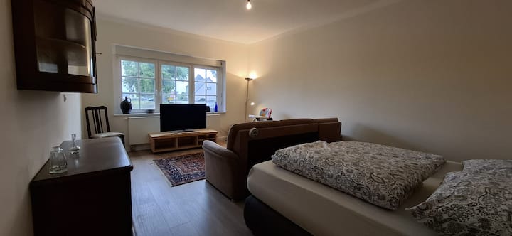 Dormitorio y sala de estar