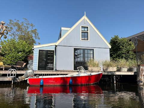 Beautiful Blue House on the Water