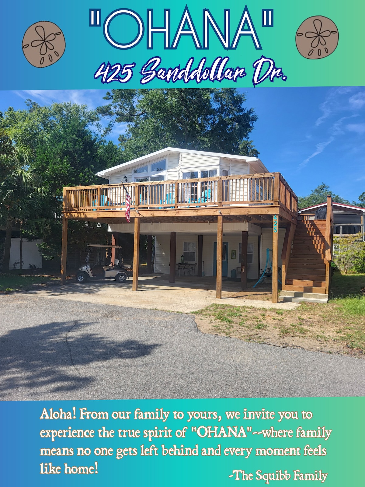 A two-story pierhouse is presented on a tree-lined street, featuring a large deck with wooden railings and stairs leading down to the ground. An American flag is visible, and a shaded parking area is available beneath the deck, alongside a parked vehicle.