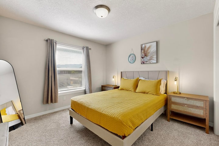 Upstairs, a queen-size bed, nightstands, a full-size mirror, lamps, closet and hangers.