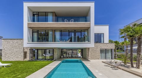Spacious Design Villa with Heated Pool, Sea view