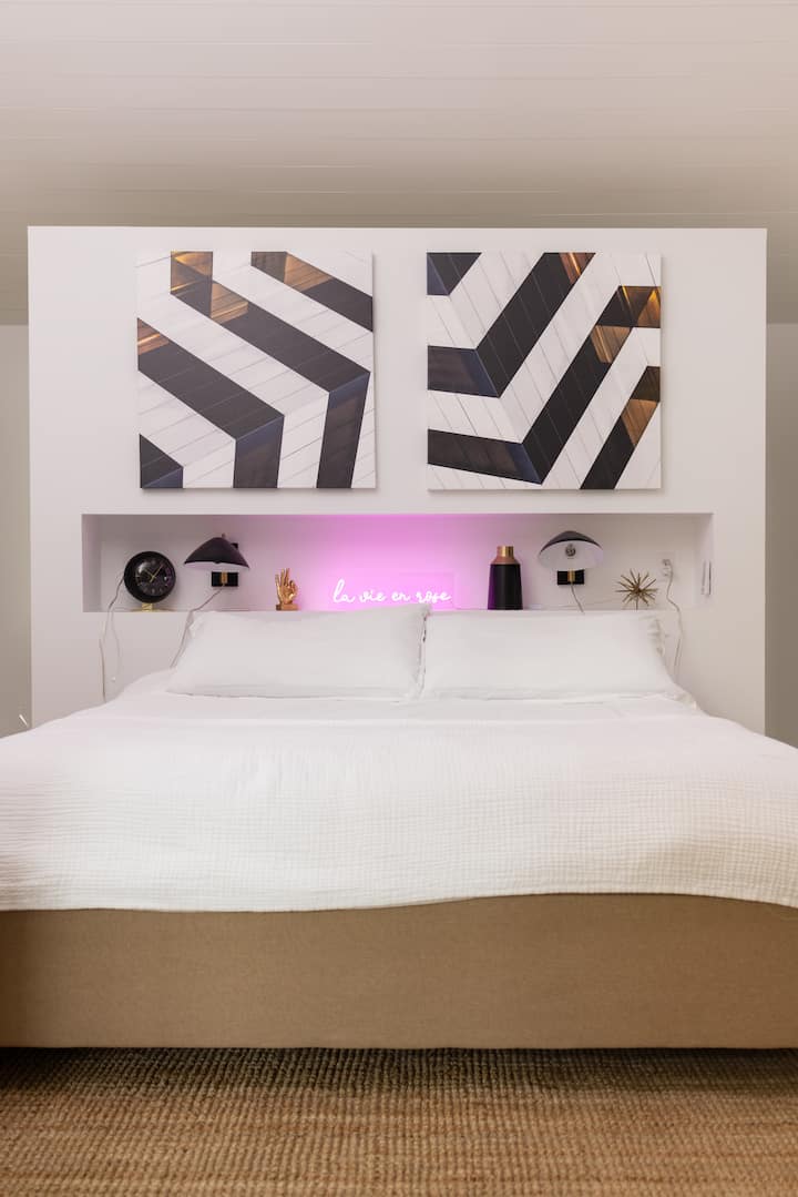 Bedroom on suite #1. King bed, walk in closet and full bathroom with large shower, soaker tub and double vintage sink. 