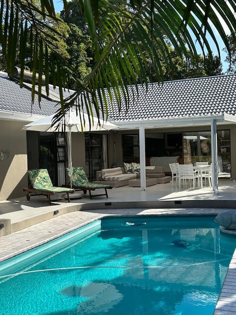 Kingfisher Guest Home in urban forest.