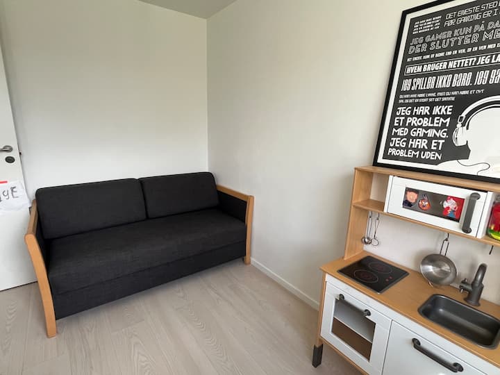 Dormitorio de invitados con sofá cama