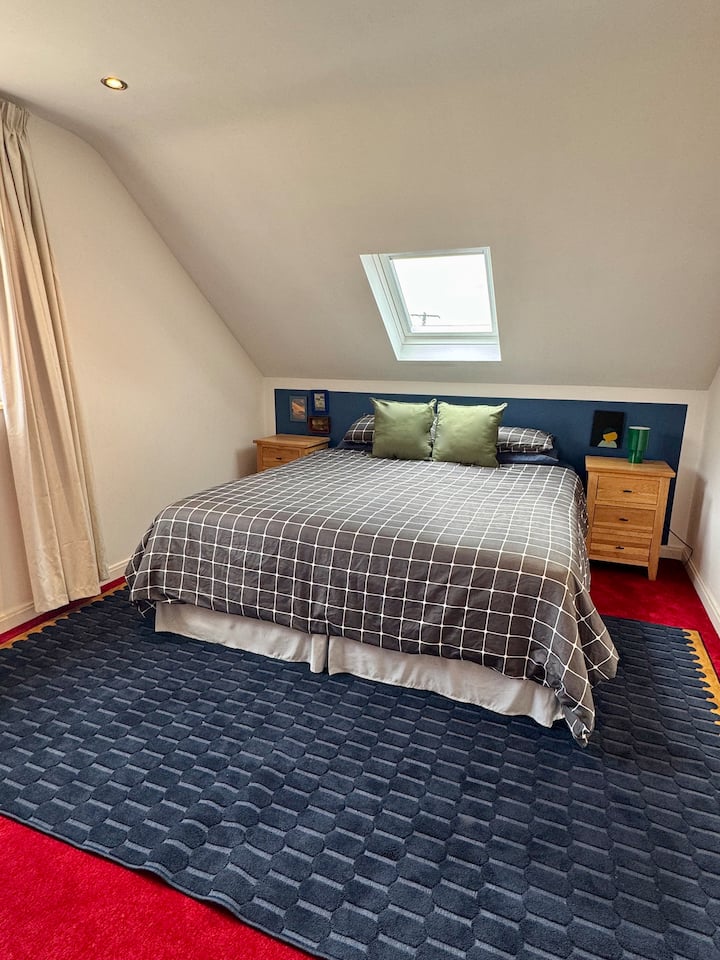 Upper Floor
Large Bedroom with small sitting area
Ceiling window with sea views
Portable heater