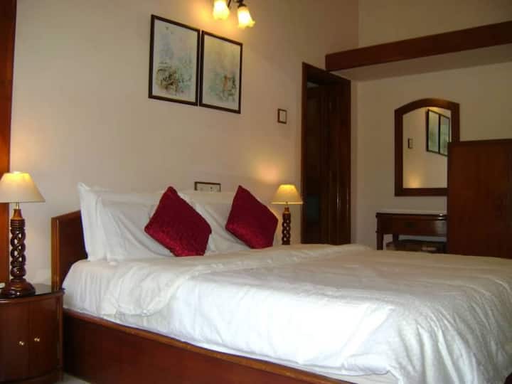 Ensuite Bedroom No. Three, with an attached terrace. Airconditioned. 32 inch Smart TV. Very Comfy Beds with mattress protector and Duvets.