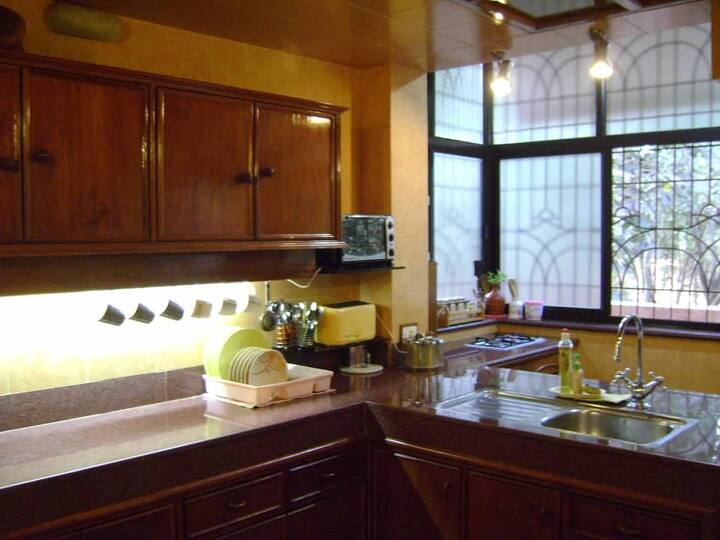 Modern, Spacious, fully-equipped kitchen with every little thing you would need. Well Lit and User friendly. We wash your dishes for you, twice a day.