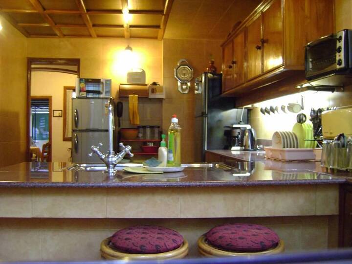 A Breakfast counter in this spacious kitchen.