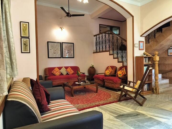 Sitting Area and Hall with a small library for both adults and kids.