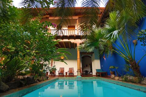 Beautiful Double Courtyard Colonial Paradise.