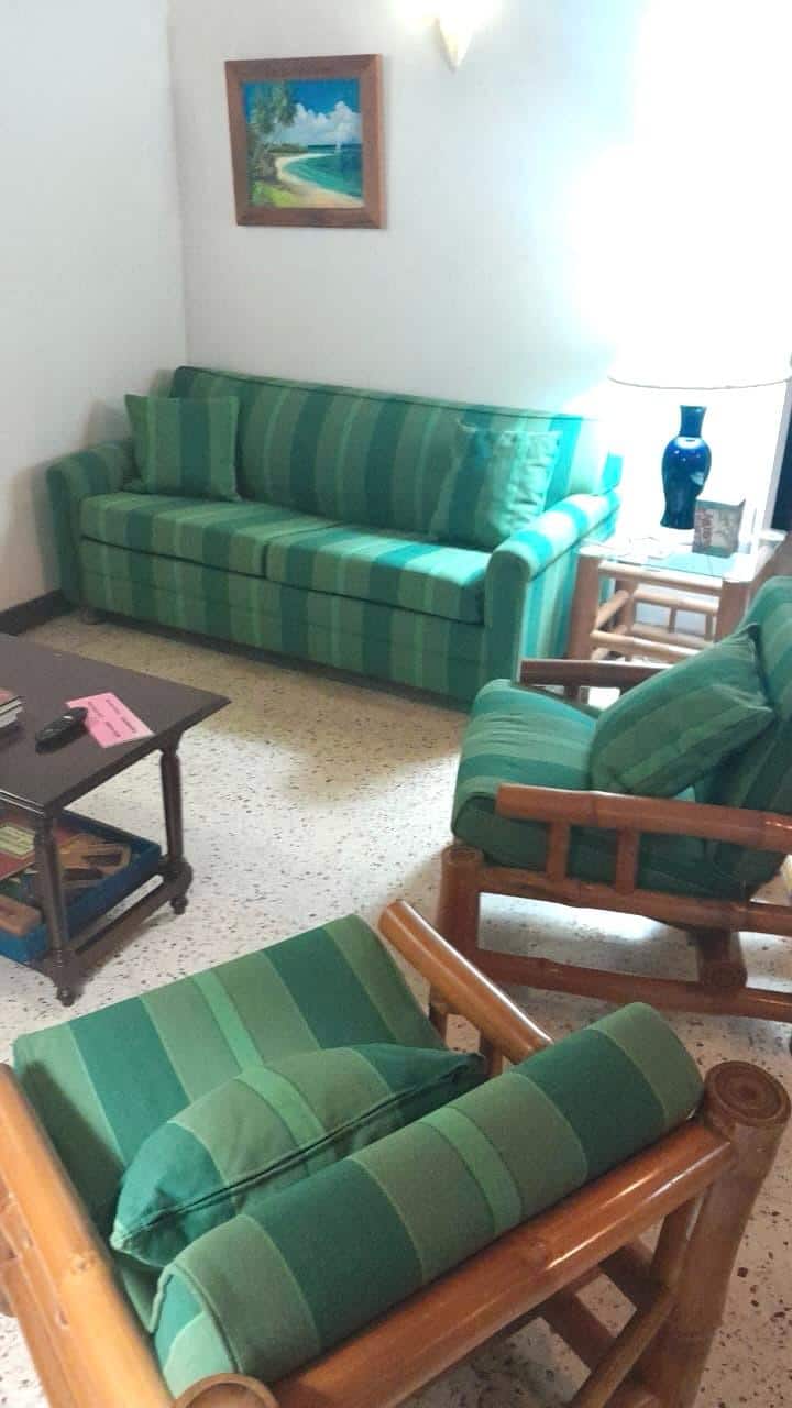 Double sleeper sofa comfortably sleeps two. Open doors and windows during the day to enjoy the island breeze right off the beach.