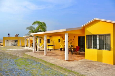 House with 2 bedrooms, kitchen & living room.