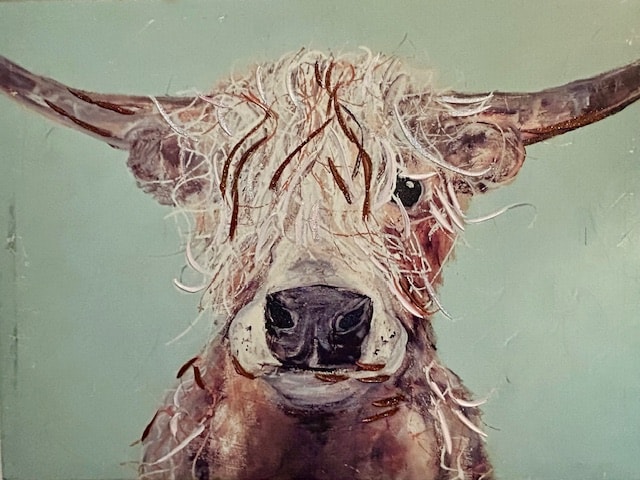 A large painting of a Highland cow features its long, shaggy hair and prominent curved horns against a pale blue background. The cow's gentle expression is emphasized by intricate detailing, capturing the texture of its fur and the natural colors of its face.