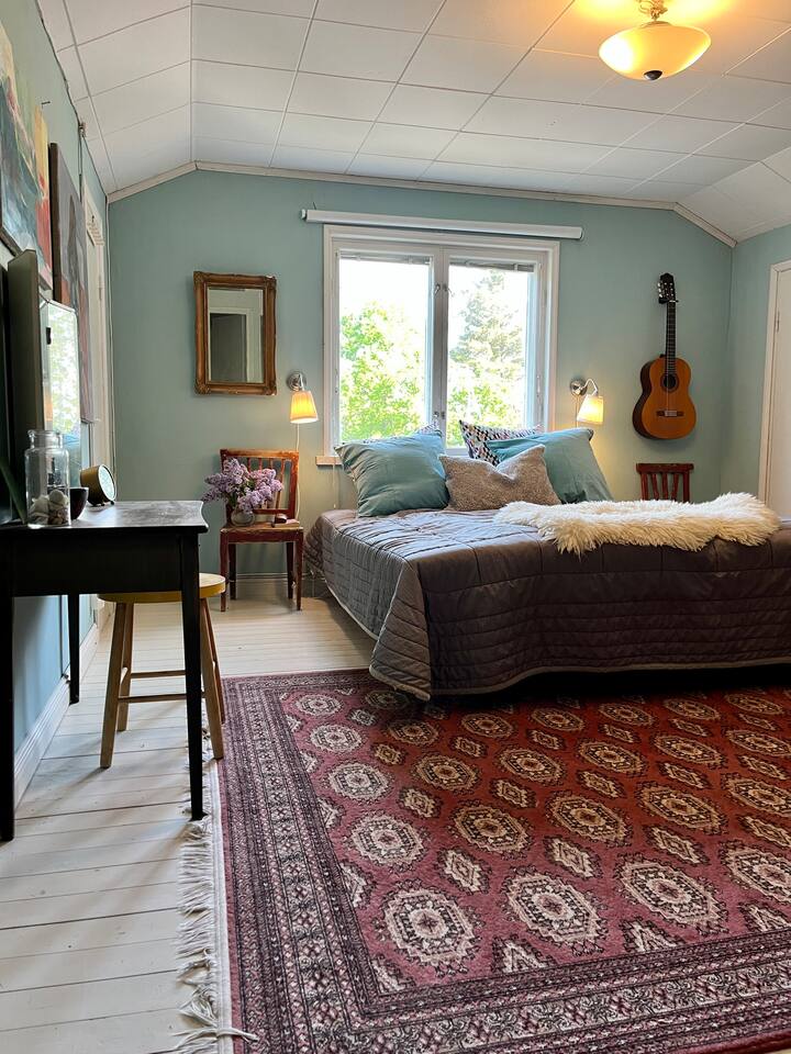 The main spacious bedroom upstairs. Sleep tight in queen size bed. In this room is available also day bed, pull out bed in King size.