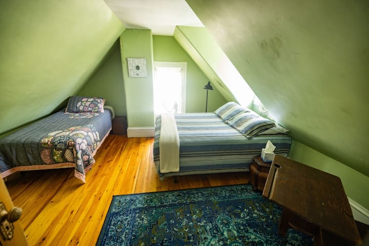 third floor bedroom top of the stairs left - across from the 3rd floor game room - one full bed and one twin bed 