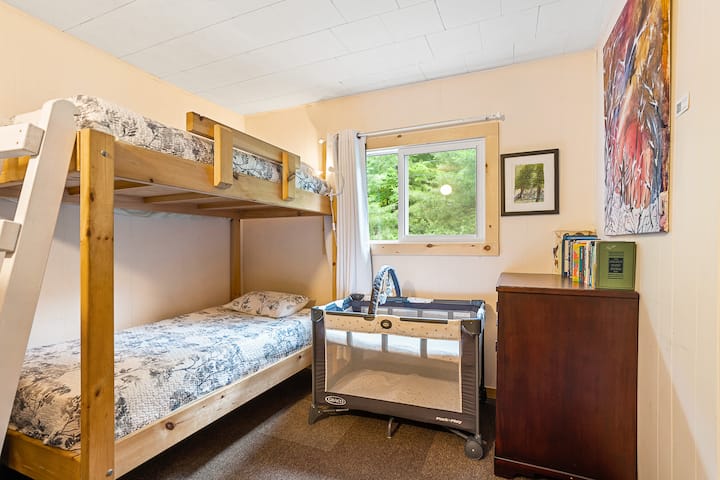 One bunk bed, sleeps two people. A pack and play crib is also available if needed. 