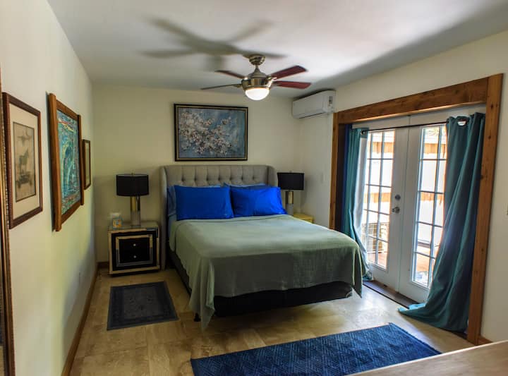 Queen Sized Bed with AC and Ceiling Fan-- Access to Back Patio Area