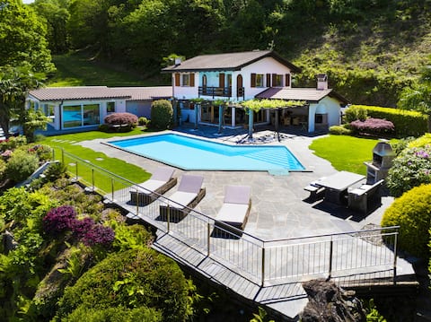 Luxury villa with panoramic suite, lake view and pool