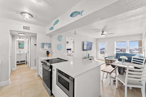 Top performing Airbnb: Beachfront condo pool laundry walkable St Pete PAG in St. Pete Beach