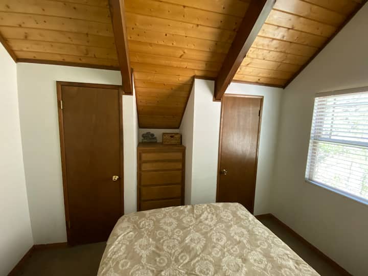 Queen bed with his and hers closets