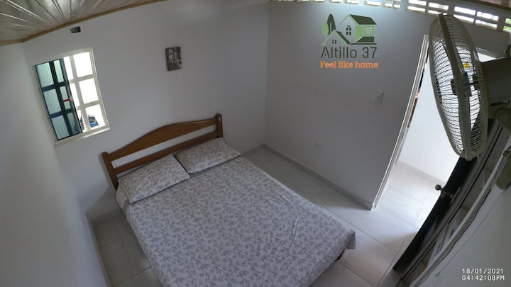 Bedroom 1 includes a double bed, with closep for storing suitcases or clothes, fan and lock on the door for your privacy.