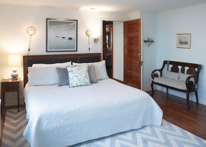 Bedroom with king size bed on main floor