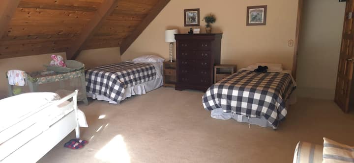 Cub corral loft has door for privacy. Master bedroom to the left outside door.