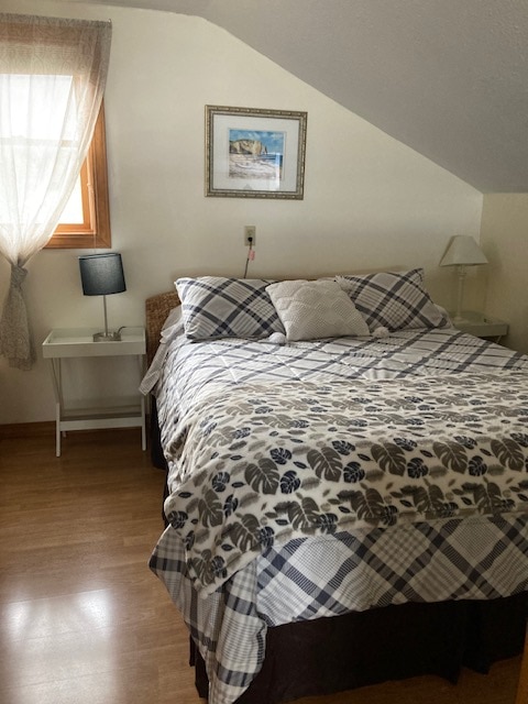 Lit queen en haut des escaliers