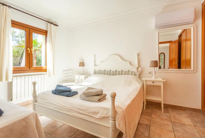 The bedroom is on the ground floor and has a double bed and a single bed