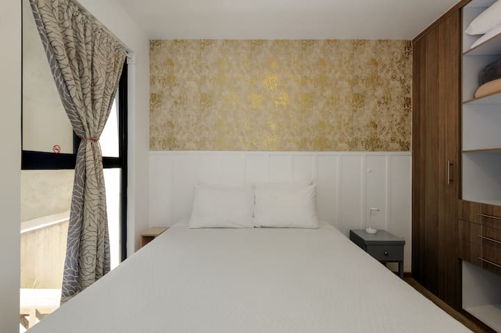 ห้องนอน 1 พร้อมเตียงควีนไซส์