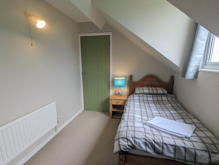 Single bedroom with countryside views