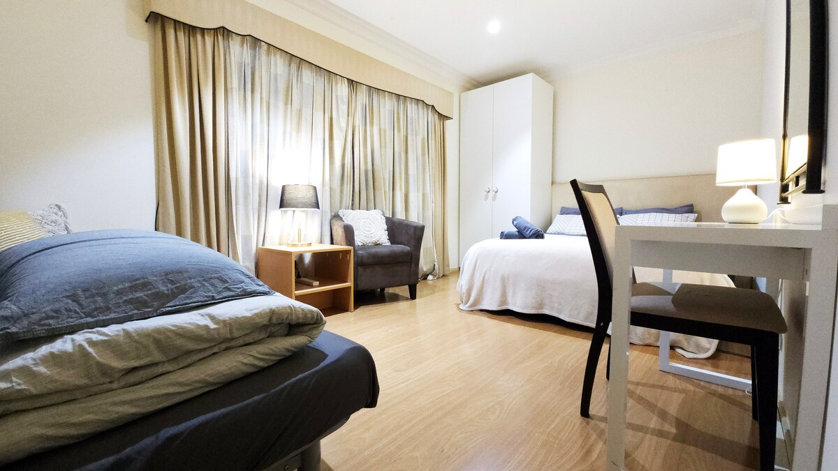 Bedroom 5 downstairs: spacious 5x3m family size, wardrobe, queen-size bed & double sofa bed- sleeps 4 guests. Access to separate bathroom and toilet downstairs.