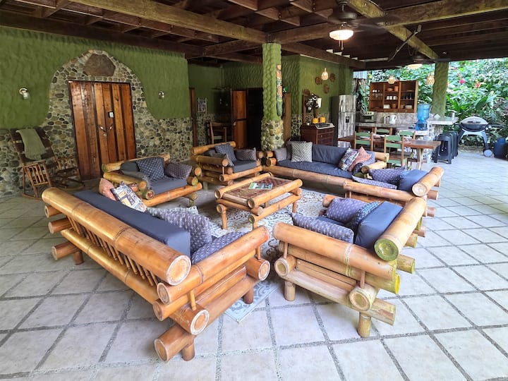 The downstairs living room is amply outfitted with comfy chairs and sofas, we know you will gather for games, stories and to be close to the pool.