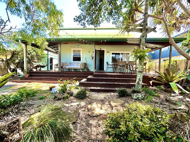 The Little Green House By the Sea