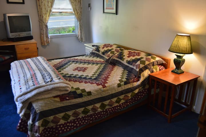 Twin/double bed in Bedroom #2.  No TV,  desk, 6 drawer dresser, children's books, attached 1/2 bathroom (toilet & sink, extra linens in cabinet)