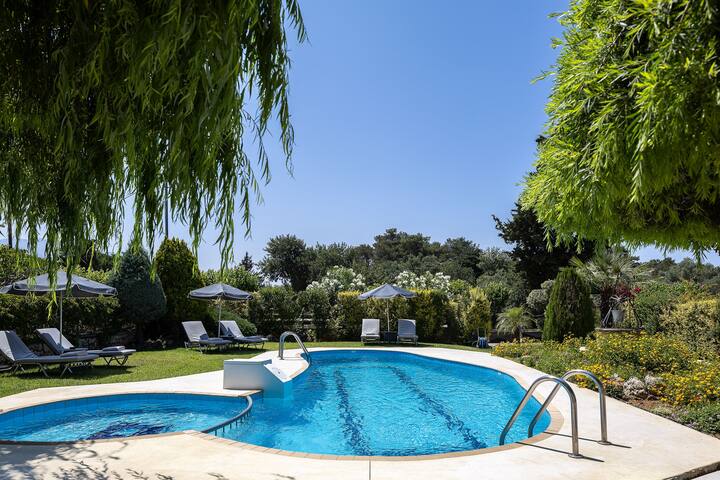 Escape to Blooming Gardens & Village Charm!