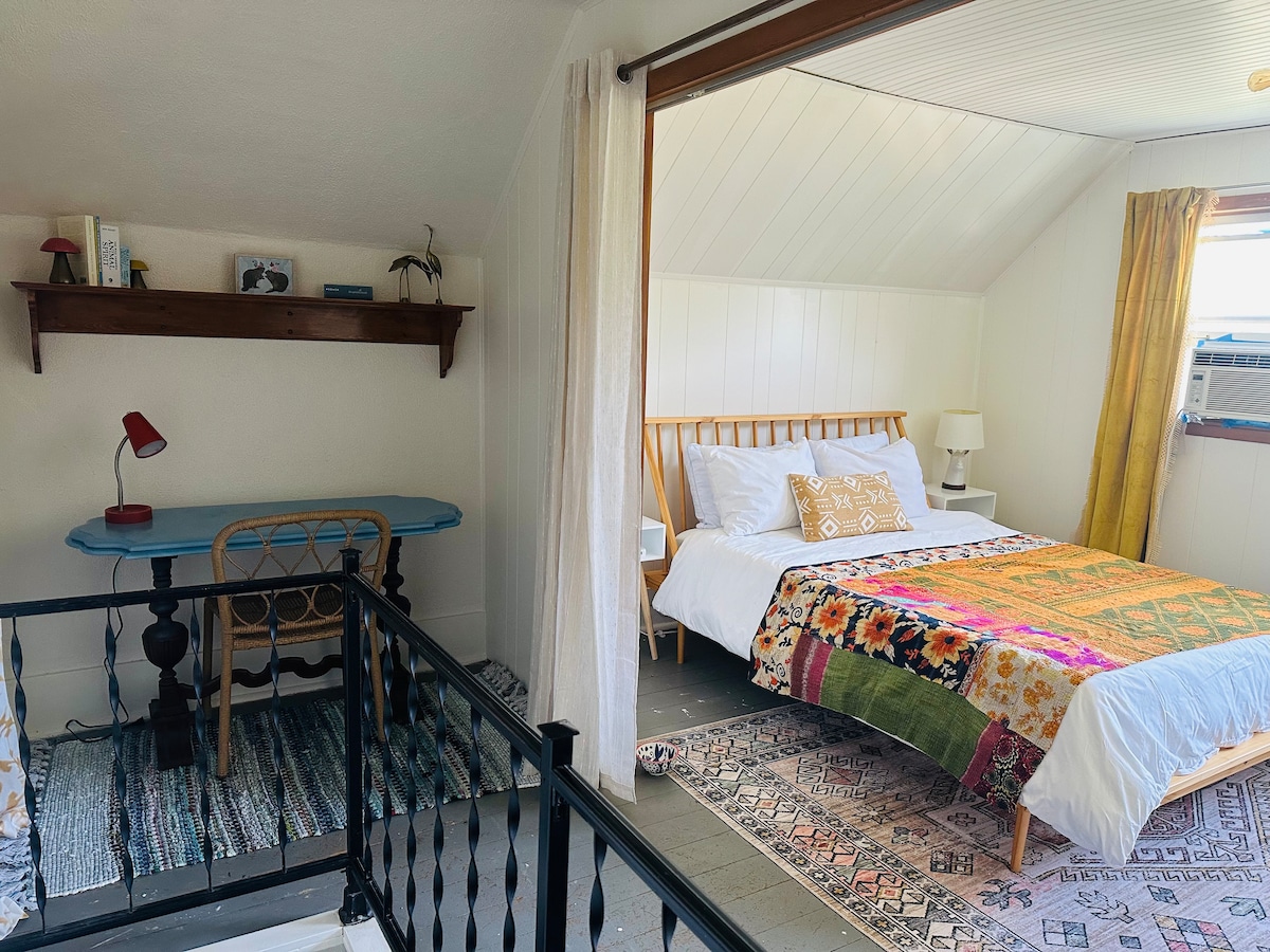 Upstairs bedroom with workspace