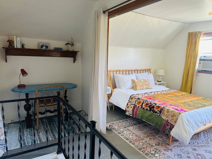 Upstairs bedroom with workspace