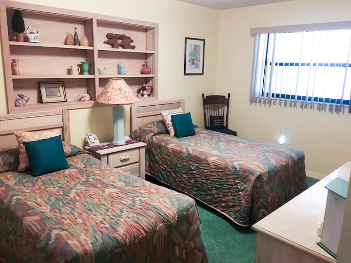 Guest Room - shows two twin's, but second bed is now a Queen Bed / Shares hall bathroom