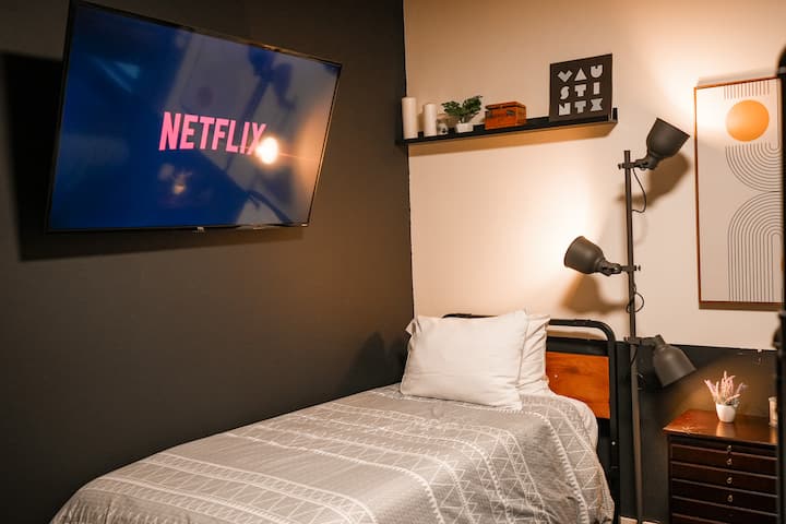 Enjoy a comfortable Twin XL mattress with high-quality sheets.