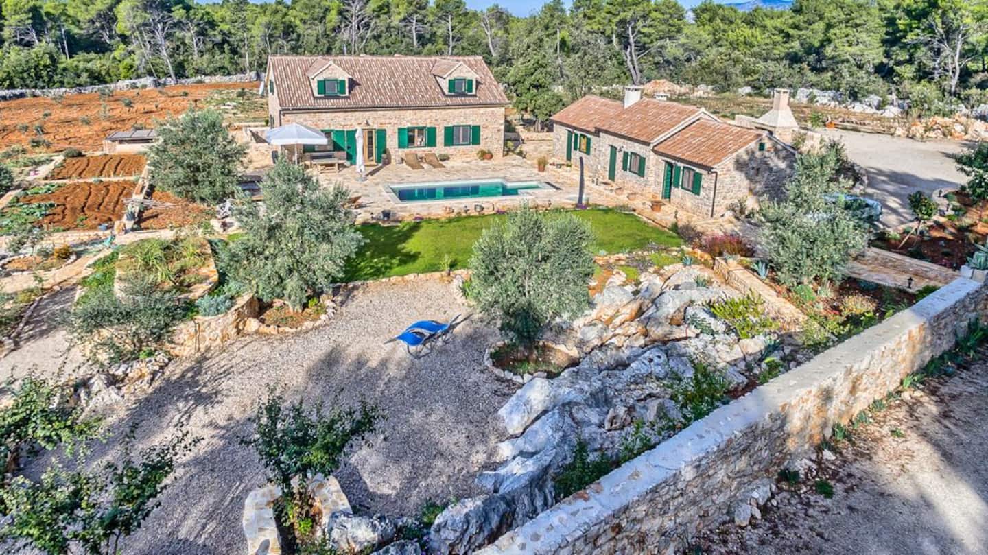 Villa Harpocrates stone house and pool among olive trees on Hvar